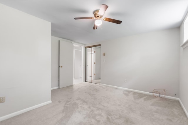 18 Halsey Pl, Valhalla, NY 10595 - unfurnished bedroom featuring light carpet, baseboards, a ceiling fan, and a closet