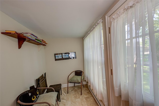 119 Exmore Ct Unit A, Ridge, NY 11961 - living area featuring baseboards
