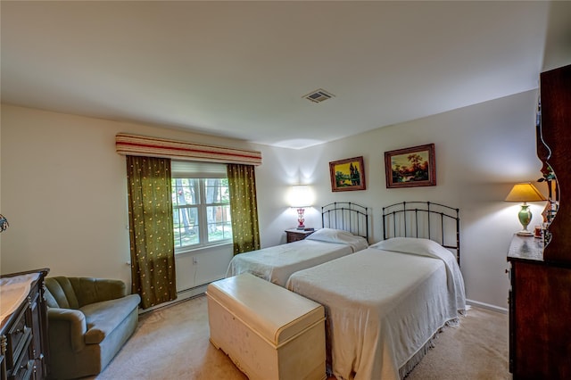 119 Exmore Ct Unit A, Ridge, NY 11961 - bedroom with light colored carpet