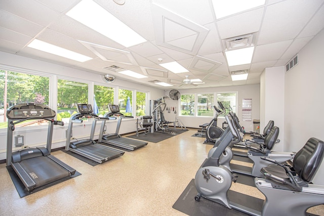119 Exmore Ct Unit A, Ridge, NY 11961 - exercise room with a paneled ceiling and a ceiling fan