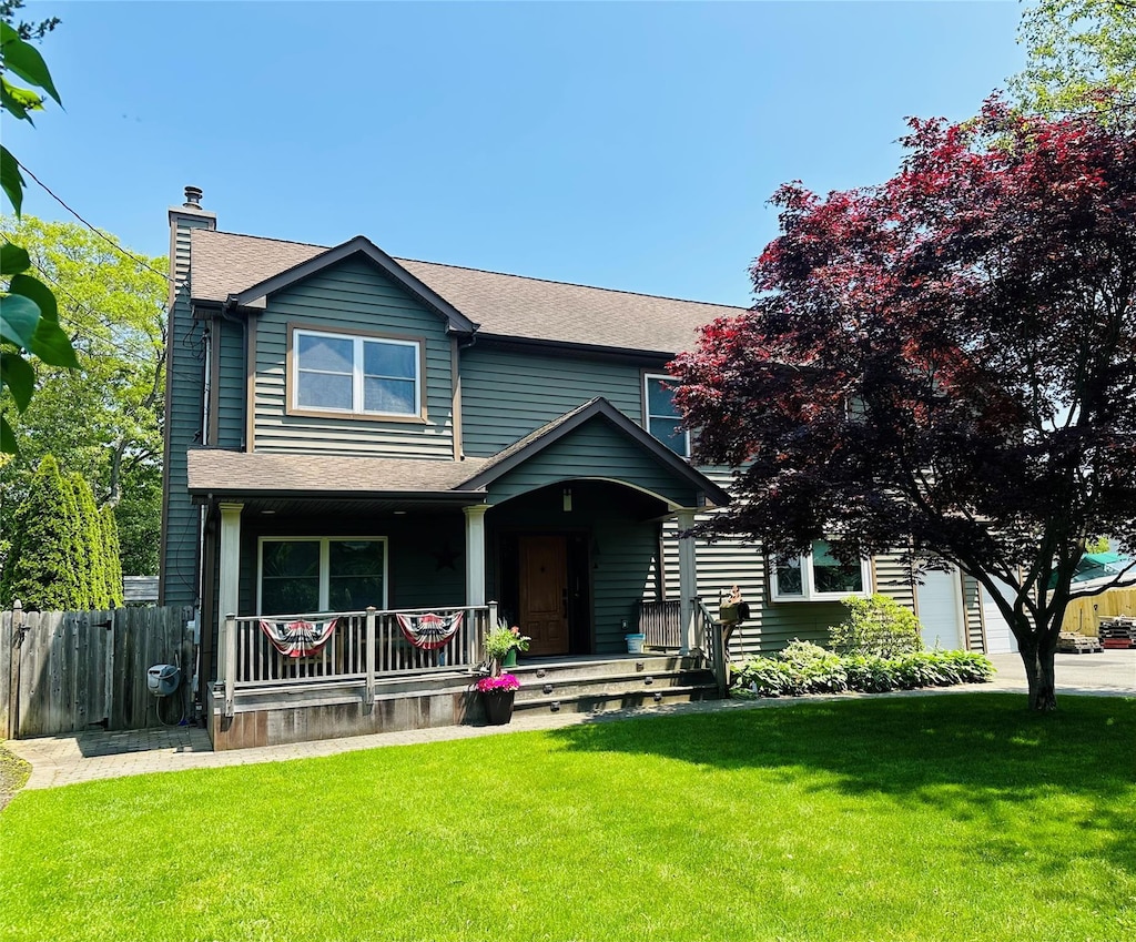 800 Bay Shore Ave, West Islip, NY 11795 - view of front of house featuring a chimney, a porch, and roof with shingles