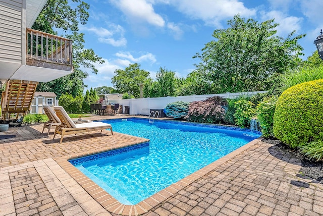 12 Alice Ln, Commack, NY 11725 - view of pool featuring a patio area, a fenced backyard, a shed, and stairway