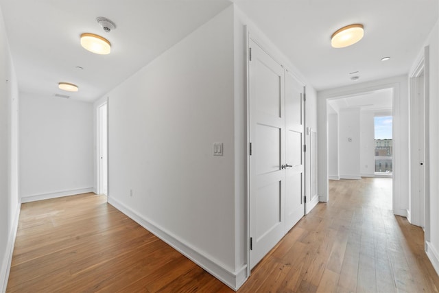 5 Renaissance Sq Unit 10G, White Plains, NY 10601 - corridor with light wood finished floors and baseboards