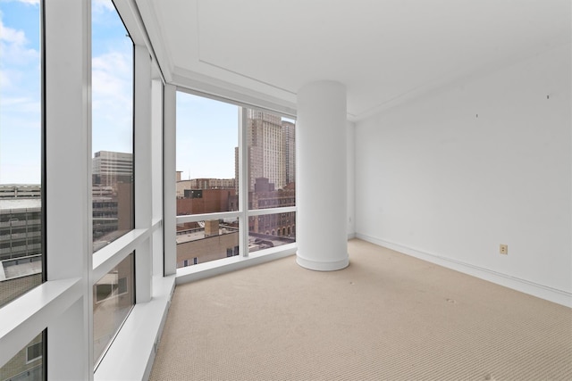 5 Renaissance Sq Unit 10G, White Plains, NY 10601 - carpeted spare room with healthy amount of natural light, baseboards, and floor to ceiling windows