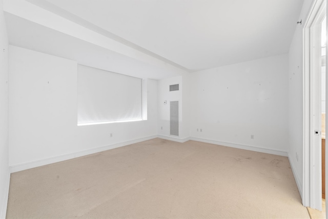 5 Renaissance Sq Unit 10G, White Plains, NY 10601 - spare room with light colored carpet, healthy amount of natural light, and baseboards