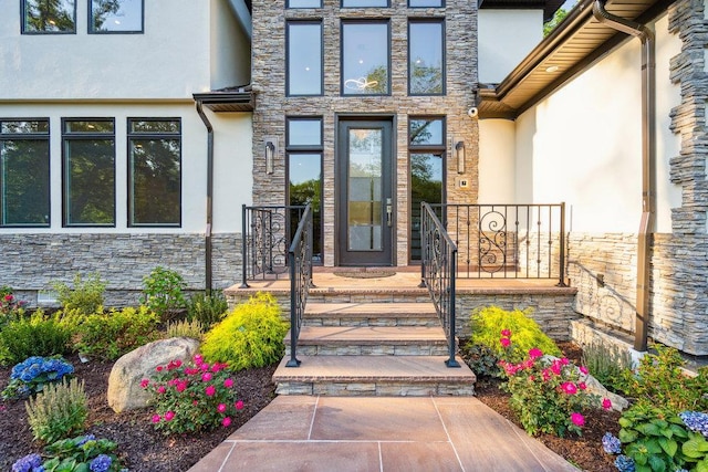 21 Arista Dr, Dix Hills, NY 11746 - view of exterior entry with stucco siding and stone siding