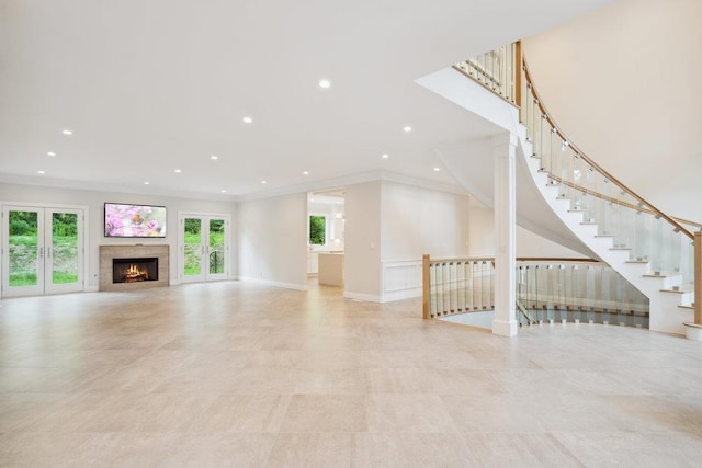 21 Arista Dr, Dix Hills, NY 11746 - unfurnished living room featuring ornamental molding, a lit fireplace, recessed lighting, and stairway