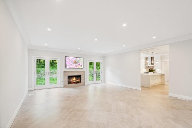 21 Arista Dr, Dix Hills, NY 11746 - unfurnished living room featuring plenty of natural light, ornamental molding, a lit fireplace, and recessed lighting