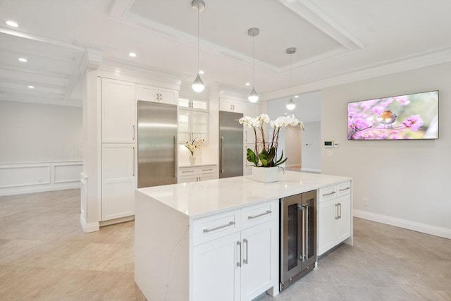 21 Arista Dr, Dix Hills, NY 11746 - kitchen with wine cooler, built in refrigerator, a raised ceiling, high quality fridge, and crown molding