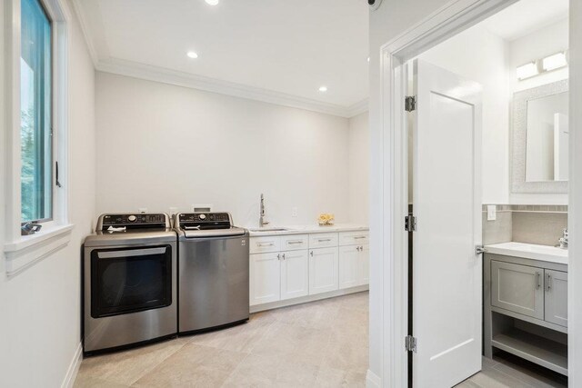 21 Arista Dr, Dix Hills, NY 11746 - laundry area featuring washer and clothes dryer, cabinet space, ornamental molding, and recessed lighting