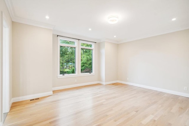 21 Arista Dr, Dix Hills, NY 11746 - spare room featuring light wood-type flooring, crown molding, and recessed lighting
