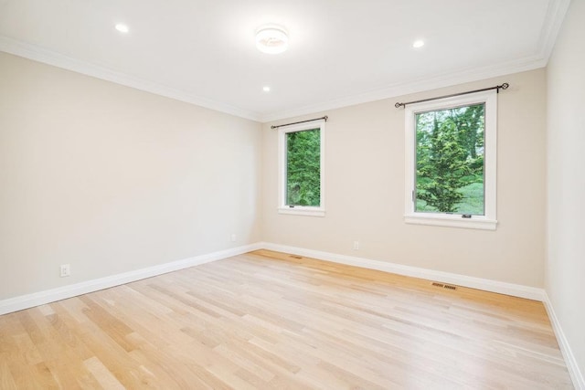 21 Arista Dr, Dix Hills, NY 11746 - spare room with light wood-type flooring, crown molding, and recessed lighting