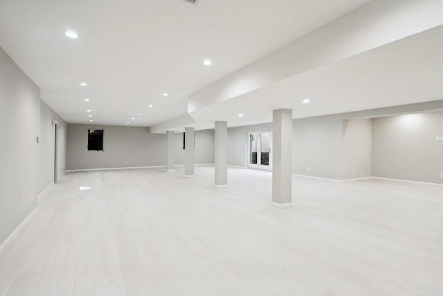21 Arista Dr, Dix Hills, NY 11746 - finished below grade area with recessed lighting and light wood-style flooring