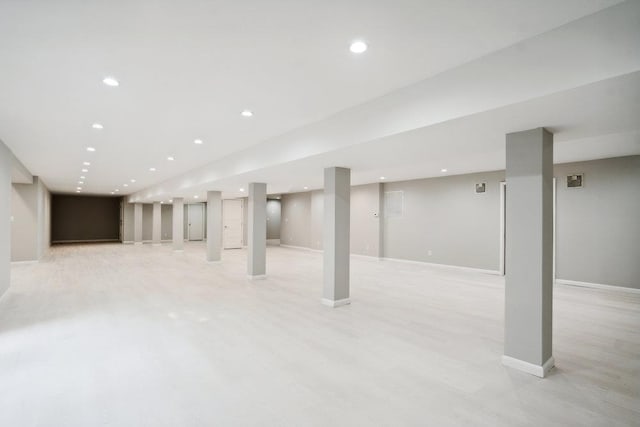 21 Arista Dr, Dix Hills, NY 11746 - finished basement featuring recessed lighting and light wood-style flooring