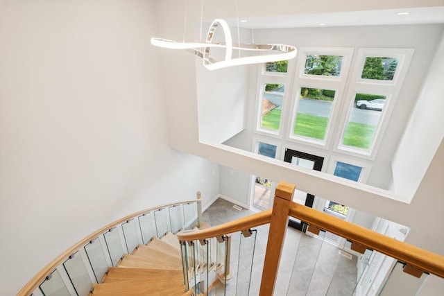 21 Arista Dr, Dix Hills, NY 11746 - stairs with a towering ceiling and recessed lighting