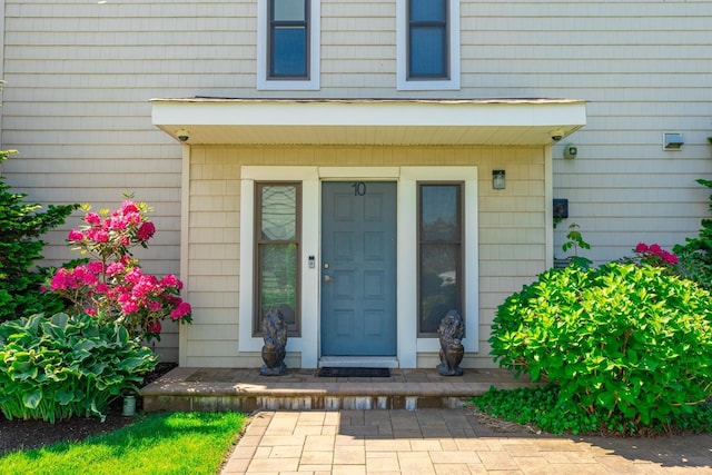 10 Hidden Harbor Dr Unit 10, Babylon, NY 11702 - property entrance featuring a surveillance system