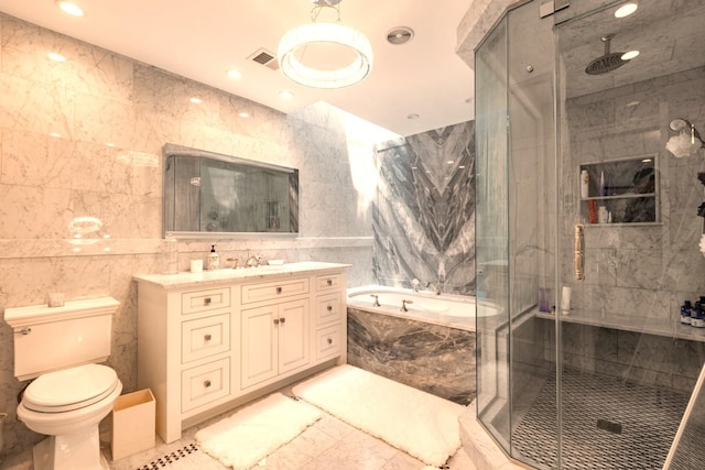 10 Hidden Harbor Dr Unit 10, Babylon, NY 11702 - full bath with tile walls, vanity, a bath, a shower stall, and toilet