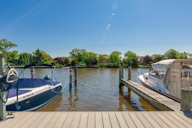 10 Hidden Harbor Dr Unit 10, Babylon, NY 11702 - dock area featuring a water view