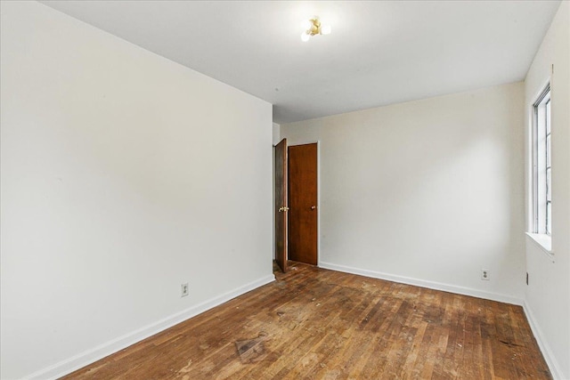 47-03 212th St, Bayside, NY 11361 - spare room featuring wood-type flooring and healthy amount of natural light
