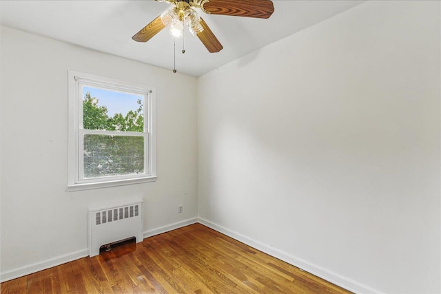 47-03 212th St, Bayside, NY 11361 - unfurnished room with radiator, wood finished floors, and ceiling fan
