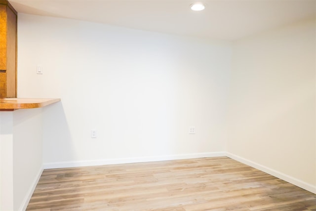 5428 65th Pl, Maspeth, NY 11378 - unfurnished room featuring light wood-type flooring, recessed lighting, and baseboards