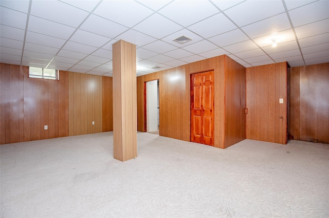 48 Zugibe Ct, West Haverstraw, NY 10993 - basement with carpet flooring, a drop ceiling, and wooden walls