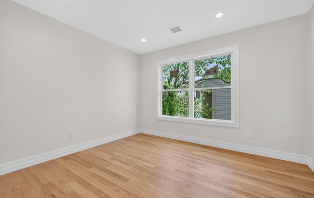 1108 Washington Pl, Baldwin Harbor, NY 11510 - unfurnished room featuring light wood finished floors and recessed lighting