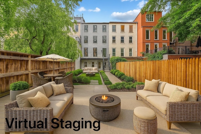 2118 45th Ave Unit 1And 2, Long Island City, NY 11101 - fenced backyard featuring an outdoor living space with a fire pit, stairs, and a patio