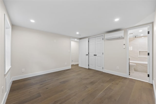 2118 45th Ave Unit 1And 2, Long Island City, NY 11101 - unfurnished bedroom featuring a wall mounted AC, wood finished floors, baseboards, and recessed lighting