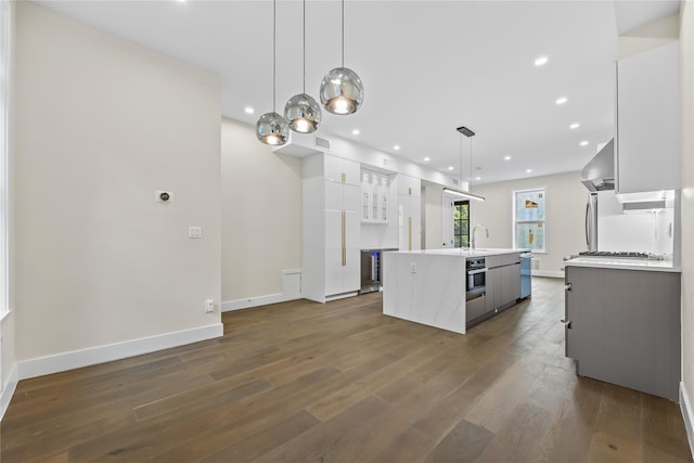 2118 45th Ave Unit 1And 2, Long Island City, NY 11101 - kitchen with modern cabinets, a sink, white cabinets, exhaust hood, and recessed lighting