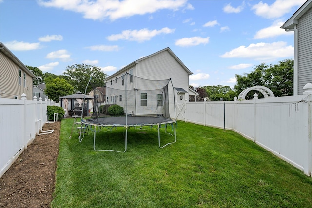 924 Otsego Ct, West Hempstead, NY 11552 - view of yard with a trampoline and a gazebo