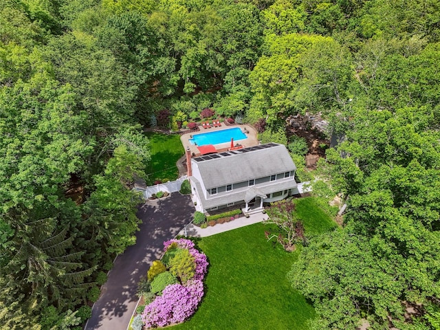 1 Highwoods Rd, Saint James, NY 11780 - view of subject property with a heavily wooded area and a pool area