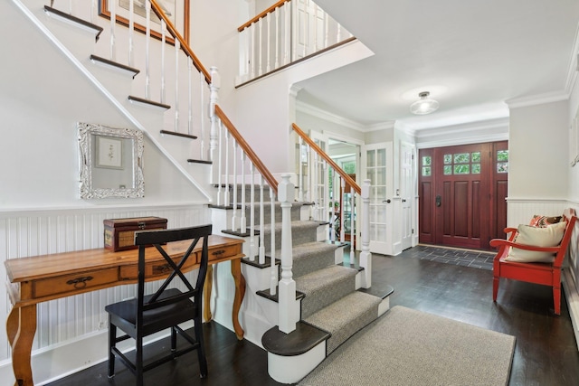 1 Highwoods Rd, Saint James, NY 11780 - foyer entrance with wood finished floors, stairway, a wainscoted wall, and crown molding