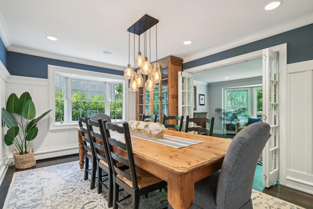 1 Highwoods Rd, Saint James, NY 11780 - dining room with dark wood-type flooring, a baseboard heating unit, crown molding, a chandelier, and recessed lighting
