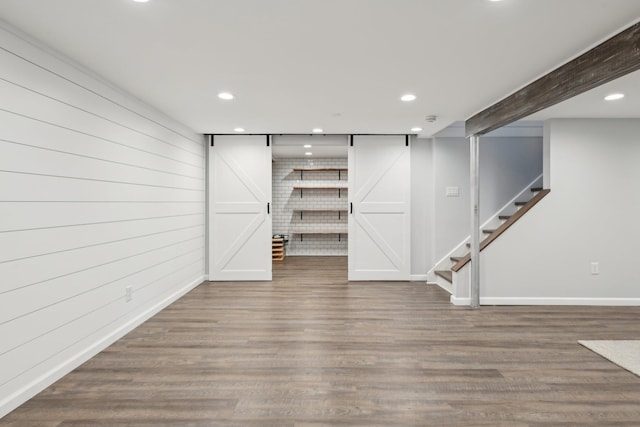 1 Highwoods Rd, Saint James, NY 11780 - finished below grade area with recessed lighting, wood finished floors, stairs, and baseboards
