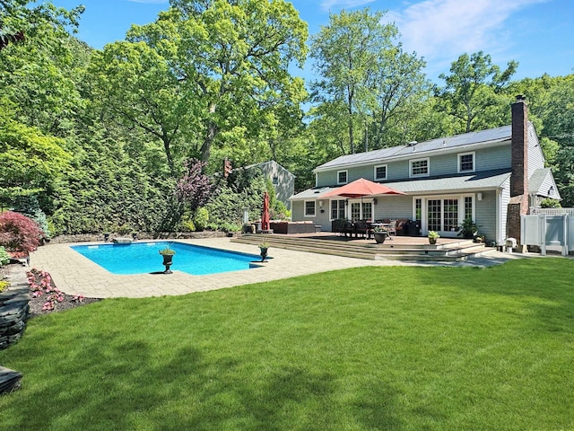 1 Highwoods Rd, Saint James, NY 11780 - swimming pool with a patio and french doors