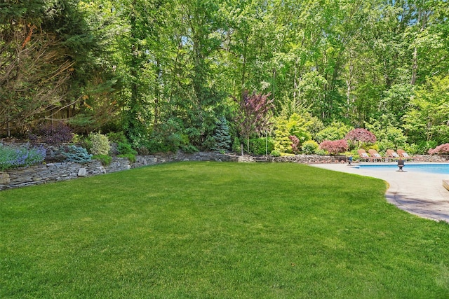 1 Highwoods Rd, Saint James, NY 11780 - view of green lawn with an outdoor pool