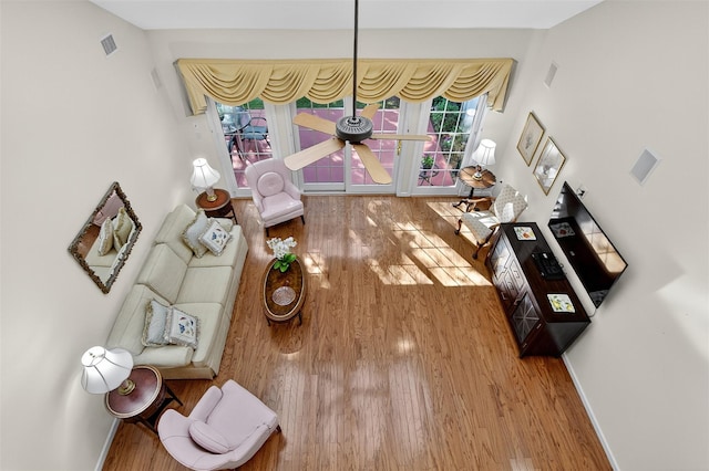 12 Miro Pl Unit 31, Port Washington, NY 11050 - living room featuring wood finished floors and ceiling fan