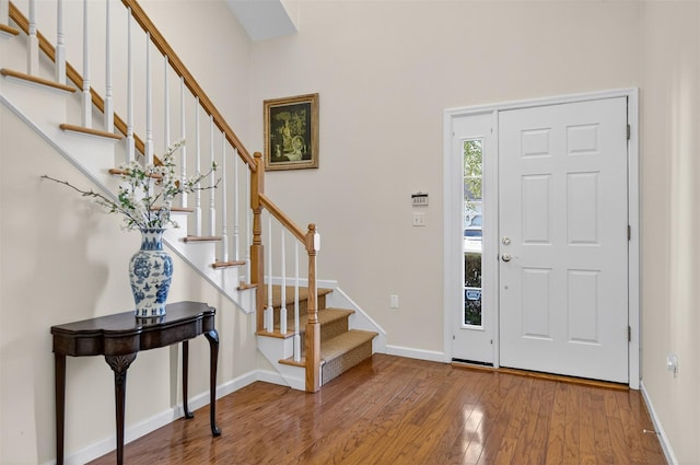 12 Miro Pl Unit 31, Port Washington, NY 11050 - entrance foyer with wood finished floors and stairs