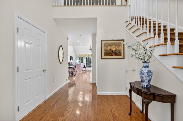 12 Miro Pl Unit 31, Port Washington, NY 11050 - hallway with wood finished floors and stairs