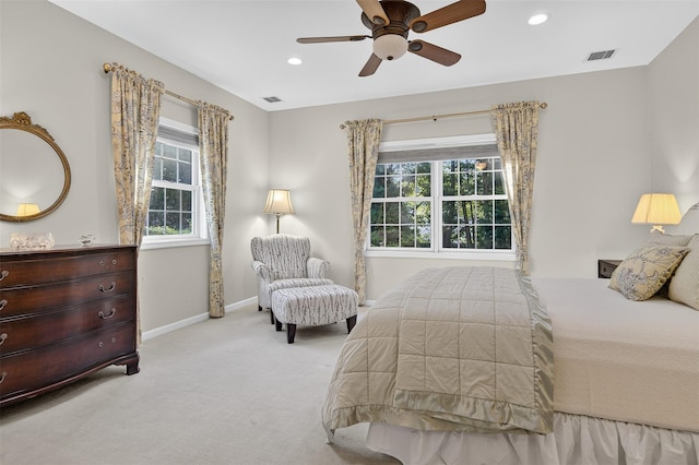 12 Miro Pl Unit 31, Port Washington, NY 11050 - carpeted bedroom featuring multiple windows, recessed lighting, and a ceiling fan