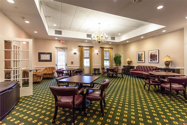 12 Miro Pl Unit 31, Port Washington, NY 11050 - playroom featuring carpet flooring, a raised ceiling, french doors, a chandelier, and recessed lighting