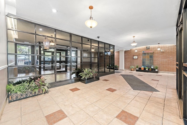68-20 Selfridge St Unit 2F, Forest Hills, NY 11375 - community lobby featuring brick wall
