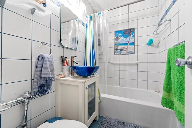 68-20 Selfridge St Unit 2F, Forest Hills, NY 11375 - full bath with shower / bath combination with curtain, vanity, toilet, tile patterned flooring, and tile walls