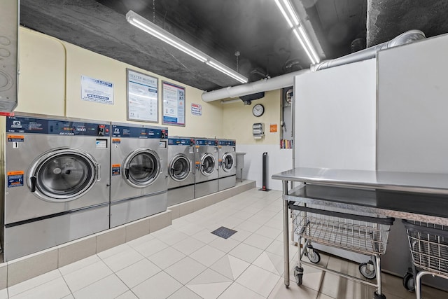 68-20 Selfridge St Unit 2F, Forest Hills, NY 11375 - communal laundry room featuring washer and dryer and tile patterned floors