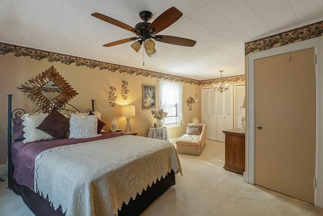 95-01 72nd Ave, Forest Hills, NY 11375 - bedroom with light colored carpet, a chandelier, and ceiling fan