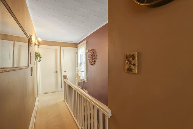 95-01 72nd Ave, Forest Hills, NY 11375 - hallway featuring an upstairs landing, light carpet, and baseboards