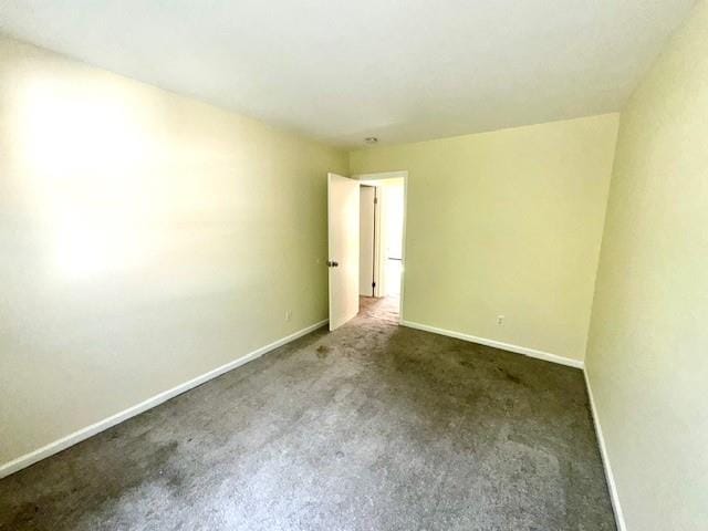 1668 Rte 9 Unit 13E, Wappingers Falls, NY 12590 - carpeted empty room with baseboards