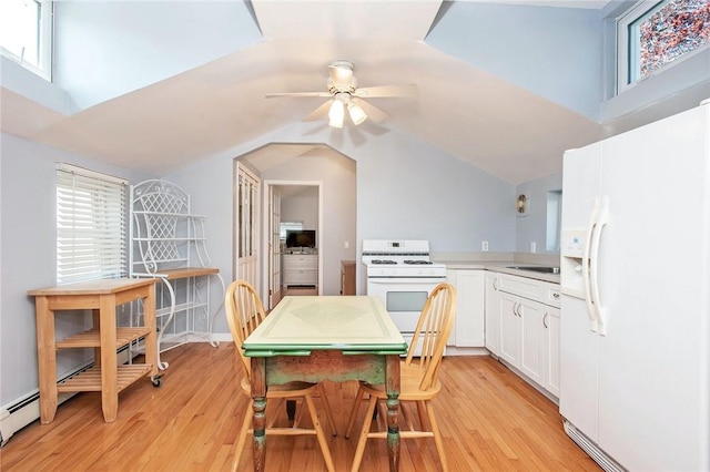 25B Edgewater Park Unit 25B, Bronx, NY 10465 - dining space with light wood-style flooring, a ceiling fan, and vaulted ceiling