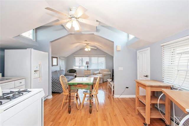 25B Edgewater Park Unit 25B, Bronx, NY 10465 - dining space with ceiling fan, light wood finished floors, vaulted ceiling, and baseboards